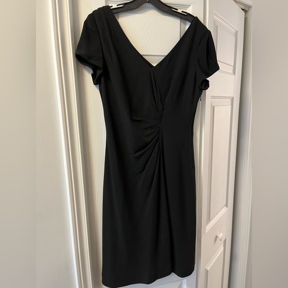 Black deep V neckline dress with gathering at waist. - Picture 1 of 3